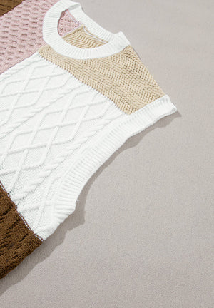 Patchwork cable knit tank top in white, tan, dusty pink, and brown acrylic with a crew neck.