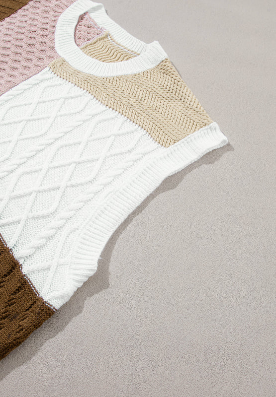 Patchwork cable knit tank top in white, tan, dusty pink, and brown acrylic with a crew neck.