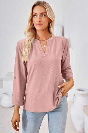 Textured henley shirt in Blush Pink with V-neck and roll-tab sleeves.