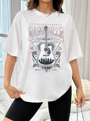 White oversized graphic tee with Nashville guitar and skyline print