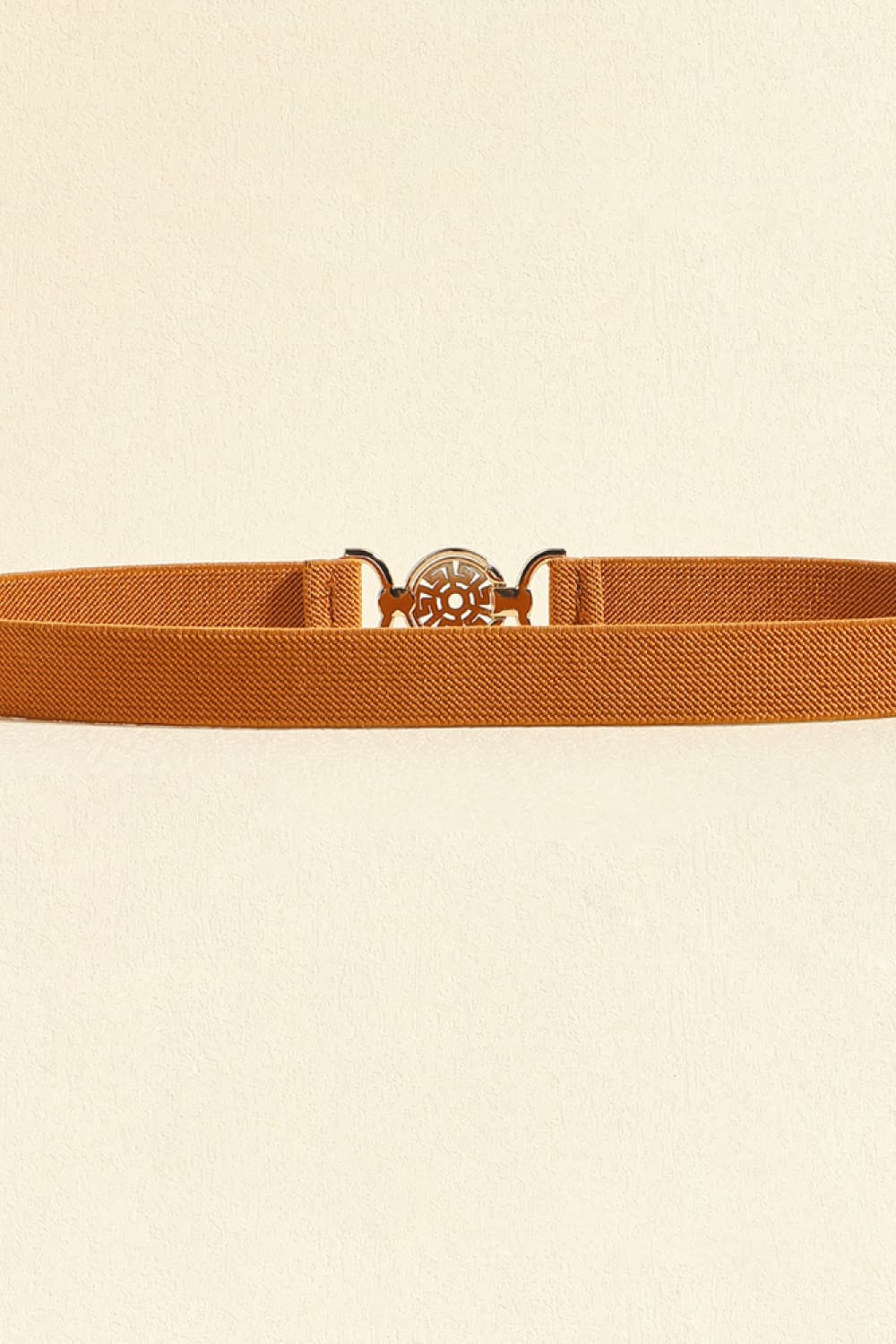 Caramel elasticated belt with medallion buckle detail