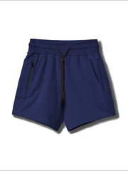 Navy fleece jogger shorts with drawcord and zippered pocket detail.