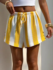 Yellow and white striped drawstring shorts with button details