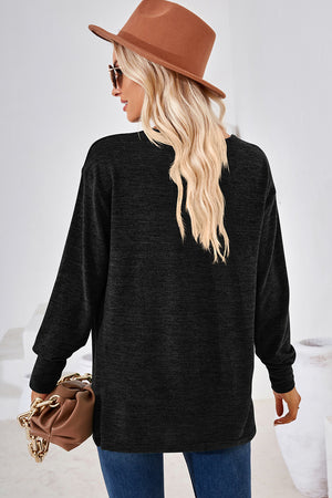 Black relaxed V-neck tunic top with long sleeves and a heathered texture.