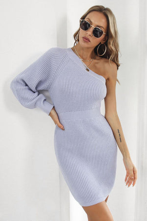 Lavender asymmetric ribbed knit dress with balloon sleeve and cinched waist.