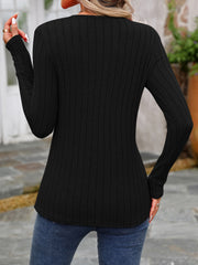 Black ribbed long sleeve top with round neck and button detail