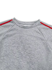 Grey loungewear set sweatshirt with red stripe detail on raglan sleeves and neckline.