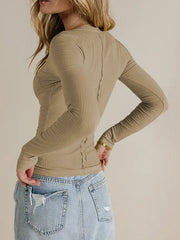 Tan ribbed V-neck long sleeve top with seam detail