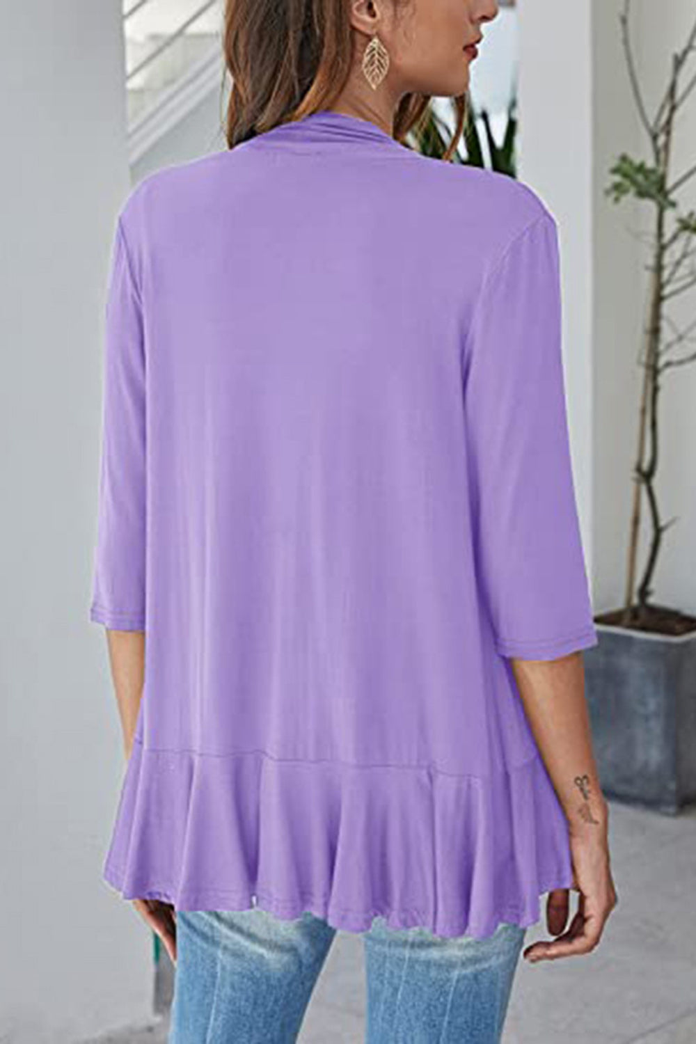 Lavender cardigan with 3/4 sleeves and asymmetrical ruffle hem