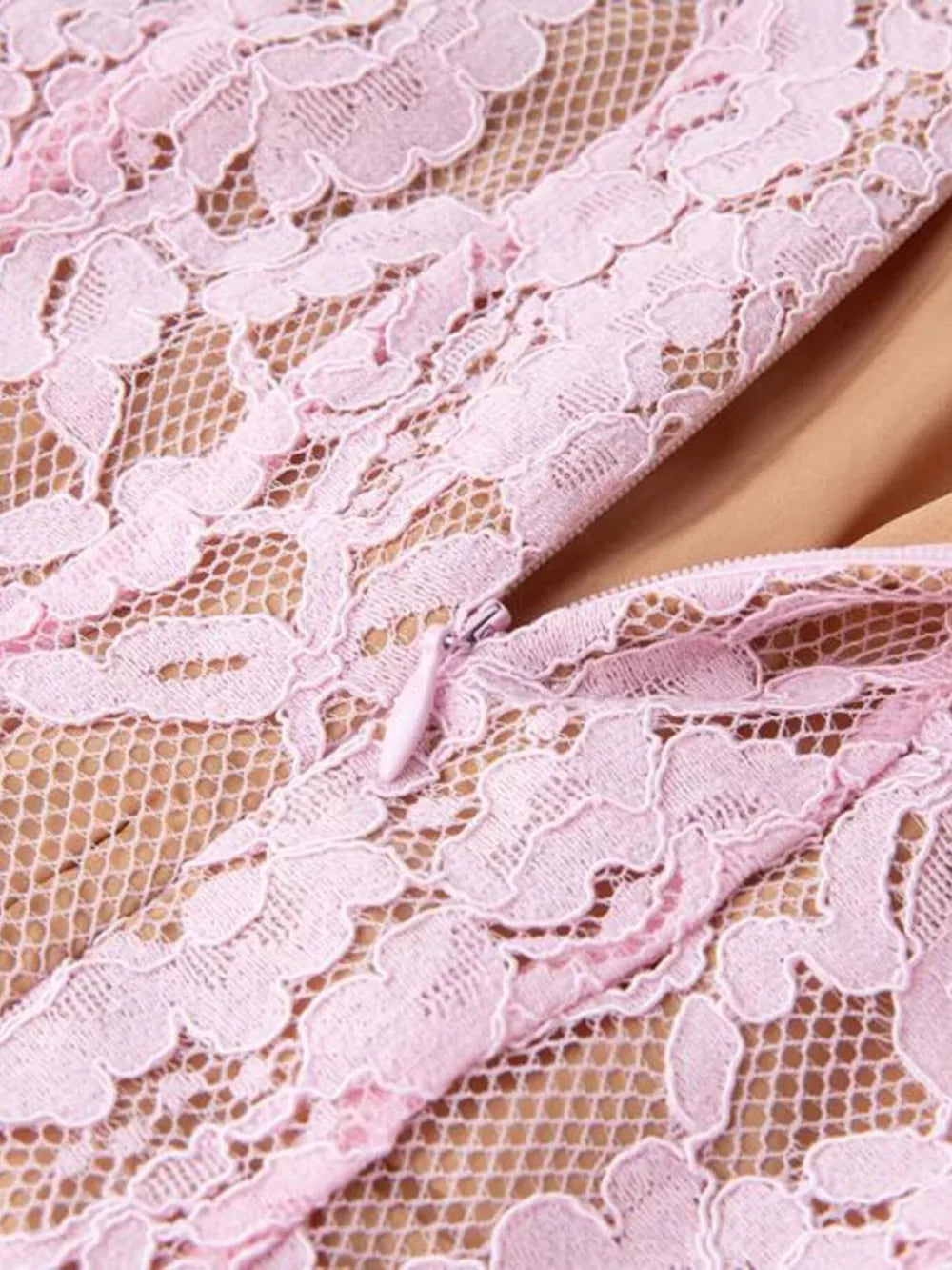 Pink lace midi dress with zipper detail and nude lining.