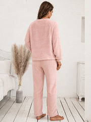 Plush raglan sleeve lounge set in watermelon pink, featuring a crew neck top and straight leg pants.