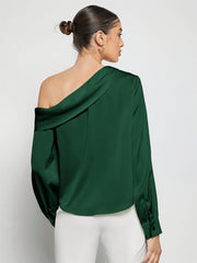 Dark green silk-effect blouse with asymmetric neckline and long sleeves.