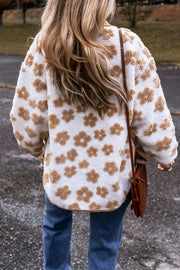 White sherpa jacket with brown floral pattern and corduroy trim detail.