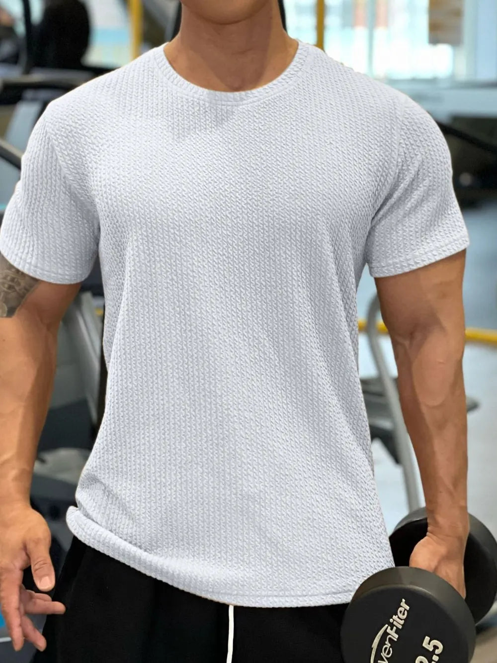Gray textured performance crew neck tee with short sleeves.