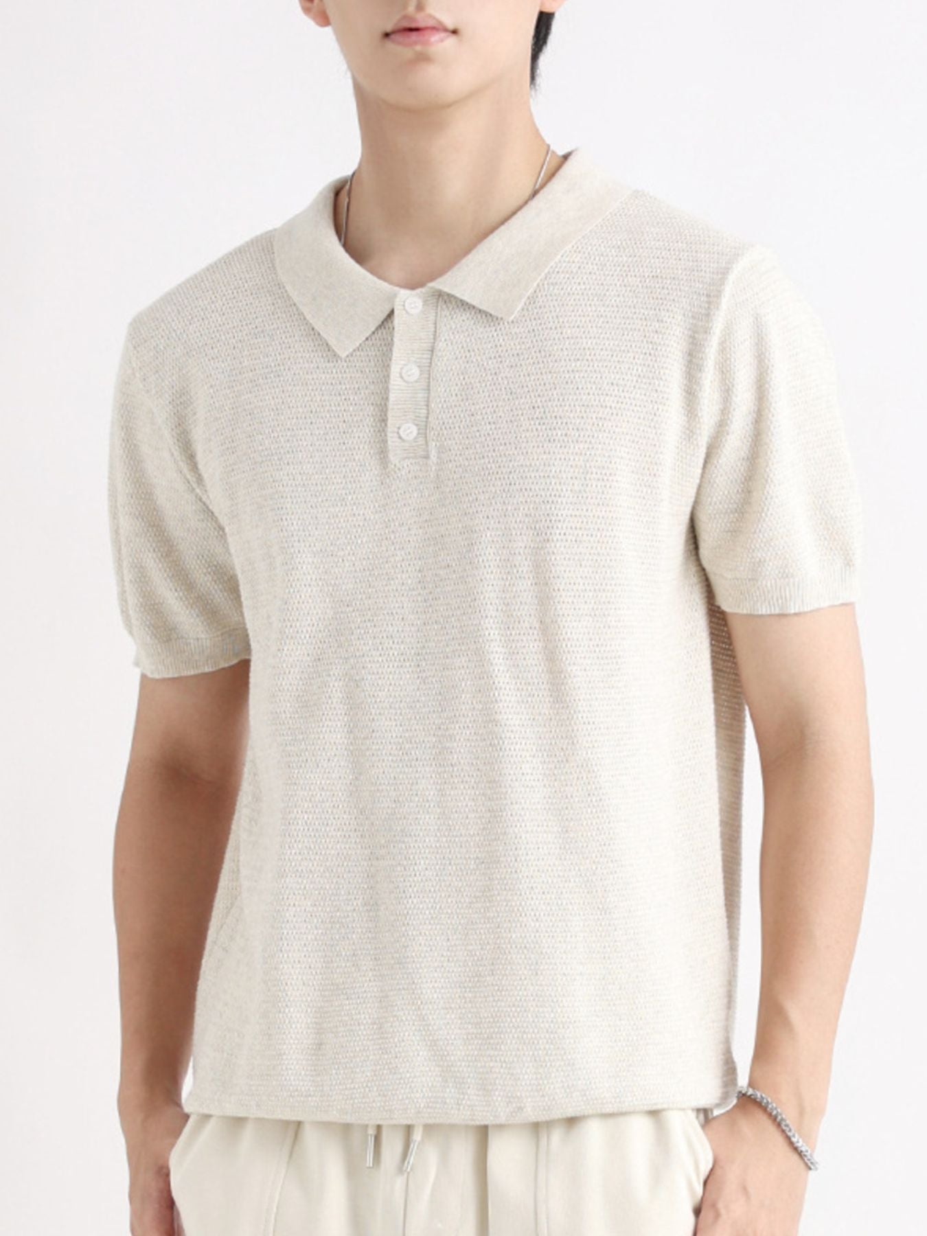 Apricot short-sleeve knit polo shirt with button detail