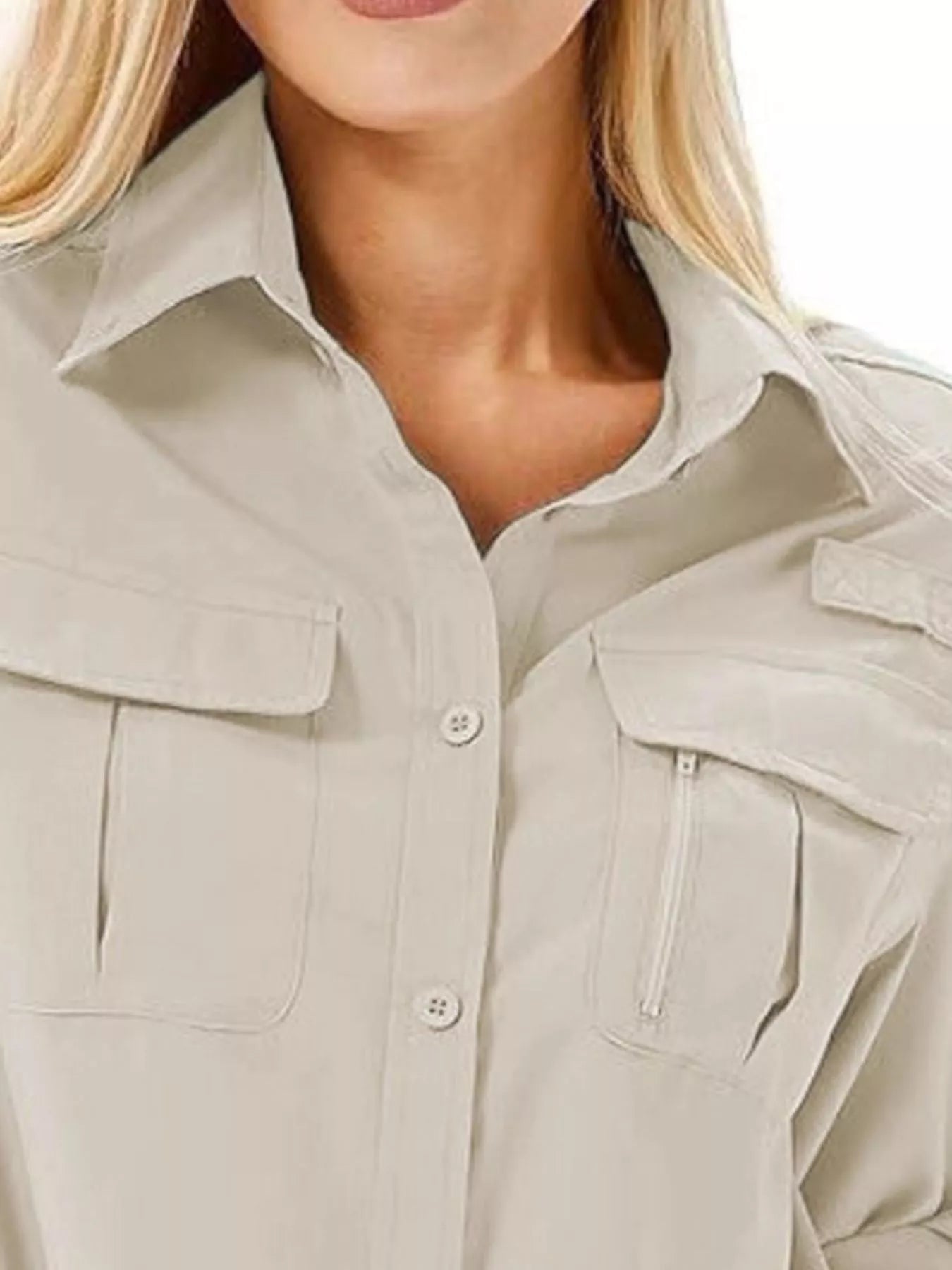 Light gray button-up shirt with chest pockets and roll-up sleeves.