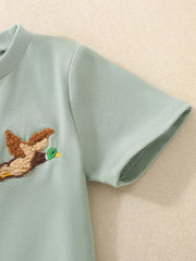 Baby set in light green cotton with embroidered duck detail on short sleeve shirt