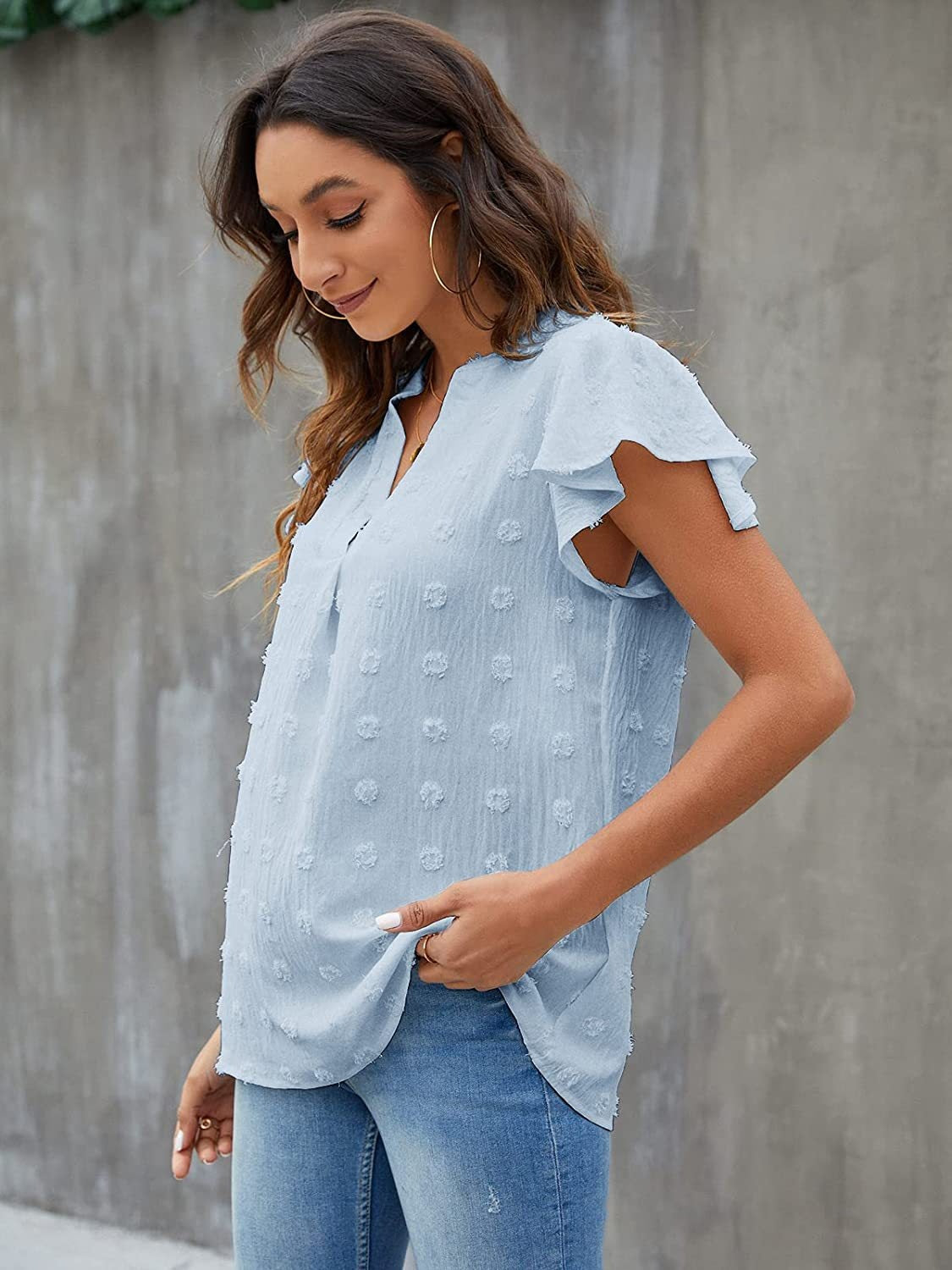 Light blue textured voile blouse with flutter sleeves and v-neck