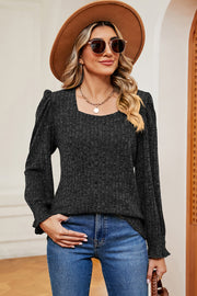 Flounce Charm square neck tee in black with puff sleeves and ribbed texture.
