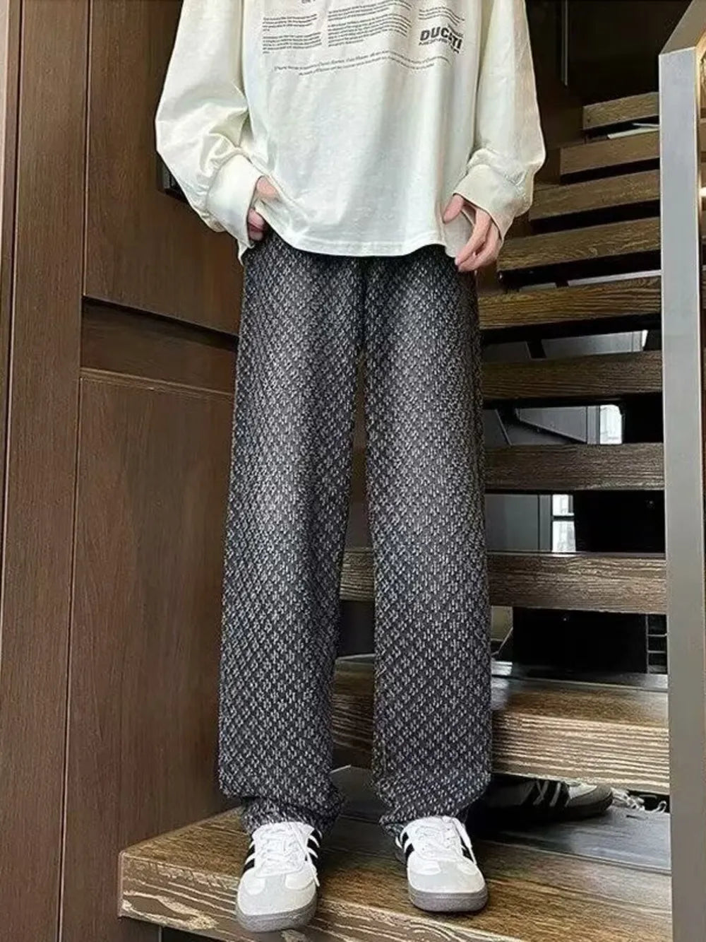 Black geometric print relaxed wide-leg jeans with a casual chic style.