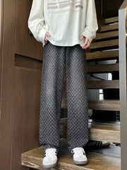 Black geometric print relaxed wide-leg jeans with a casual chic style.