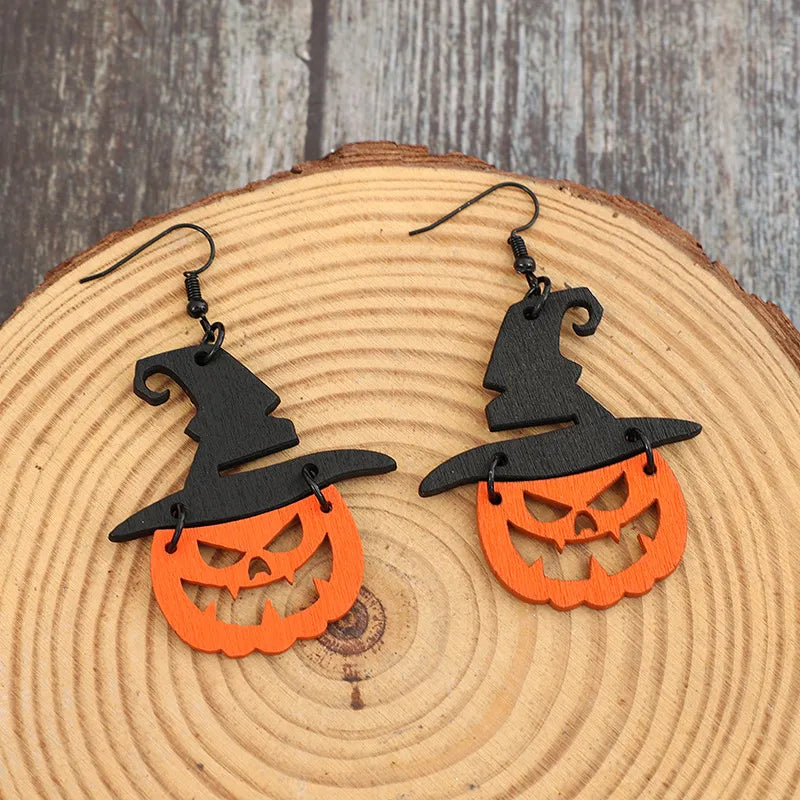 Black witch hat pumpkin Halloween earrings made of wood.