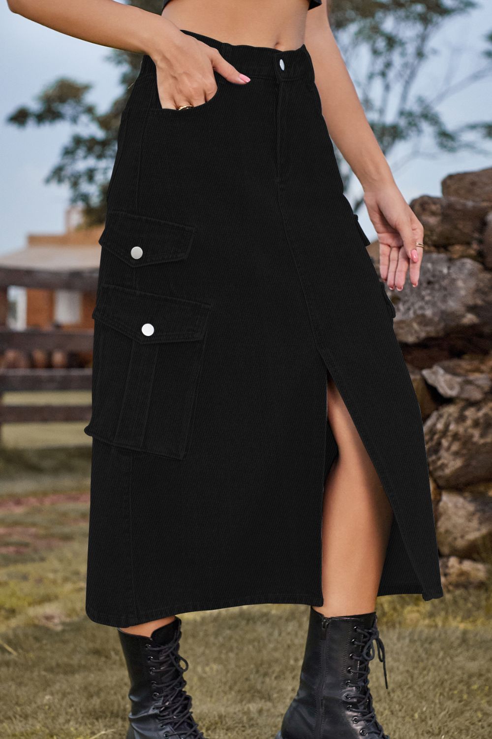 Black denim midi skirt with cargo pockets and front slit