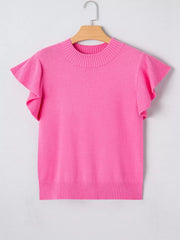 Pink knit top with ruffled short sleeves and ribbed mock neckline.