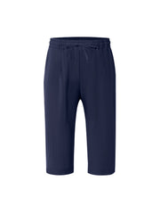 Navy relaxed fit drawstring cropped sweatpants with a casual, loose cut.