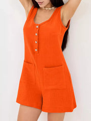 Orange crinkled cotton button-down sleeveless romper with patch pockets