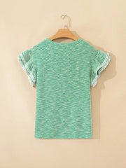 Women's green and white striped cotton blouse with ruffle trim sleeves.