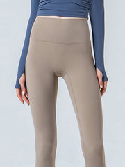 Beige sculpted crop leggings with a high waistband and subtle seam details.