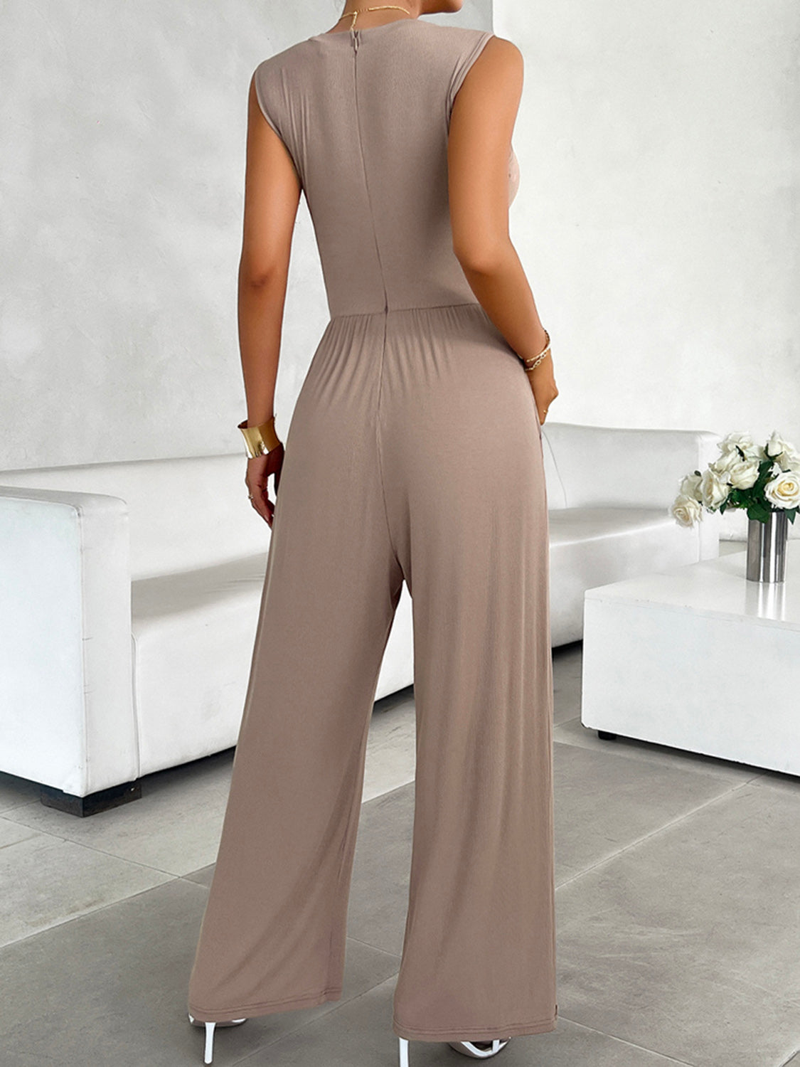 Mocha ribbed bodice wide leg jumpsuit with cap sleeves and a zipper back.