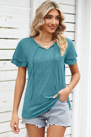 Turquoise flutter sleeve henley tee with tie neckline and layered sleeves.