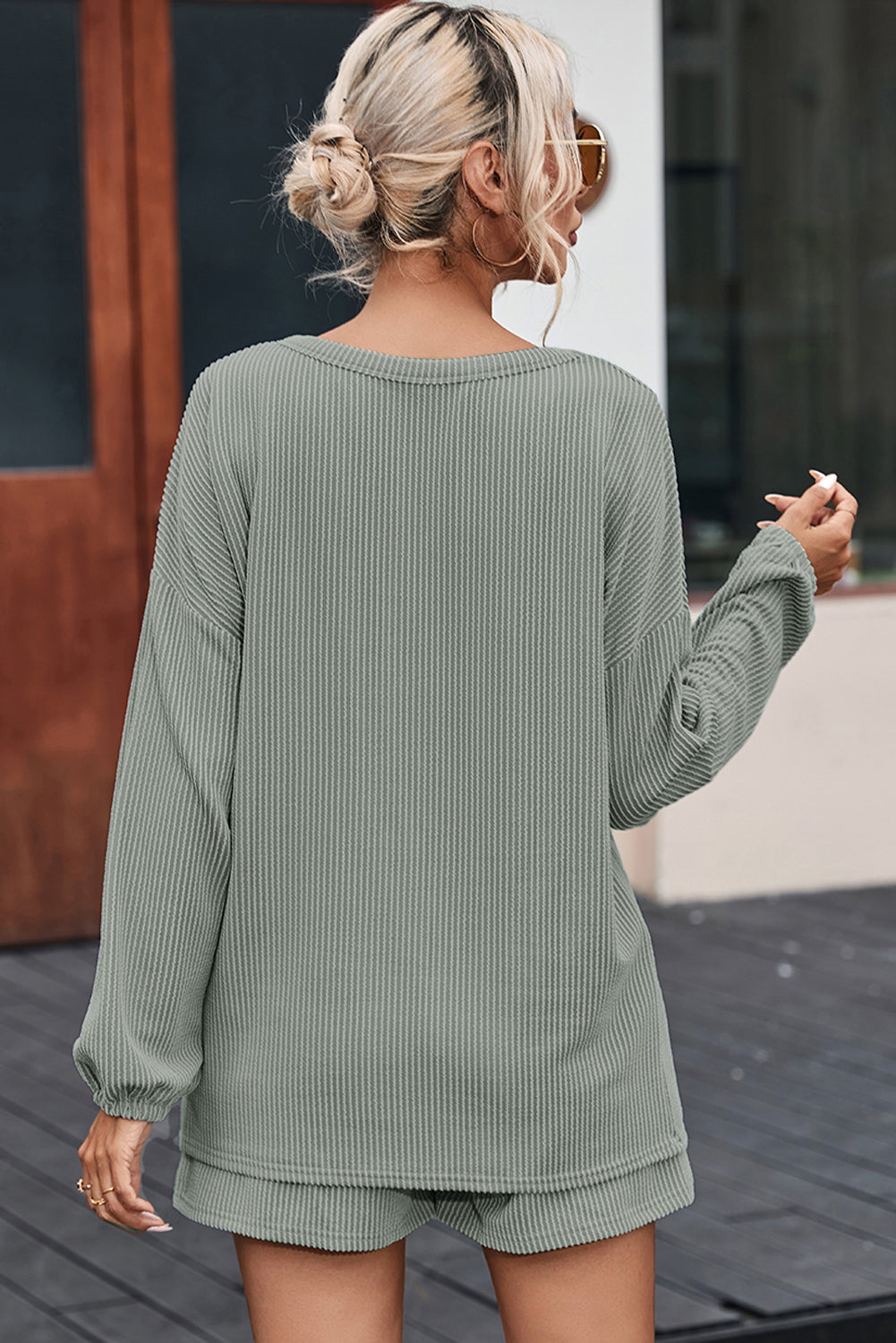 Sage ribbed knit outfit set with long sleeves and shorts, casual loungewear.