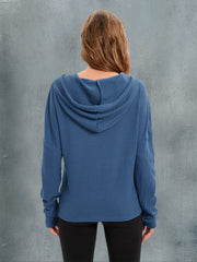 Dusty blue waffle knit relaxed fit hoodie with hood and long sleeves.