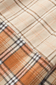 Patchwork plaid knit shacket in sherbet with contrasting plaid panels.