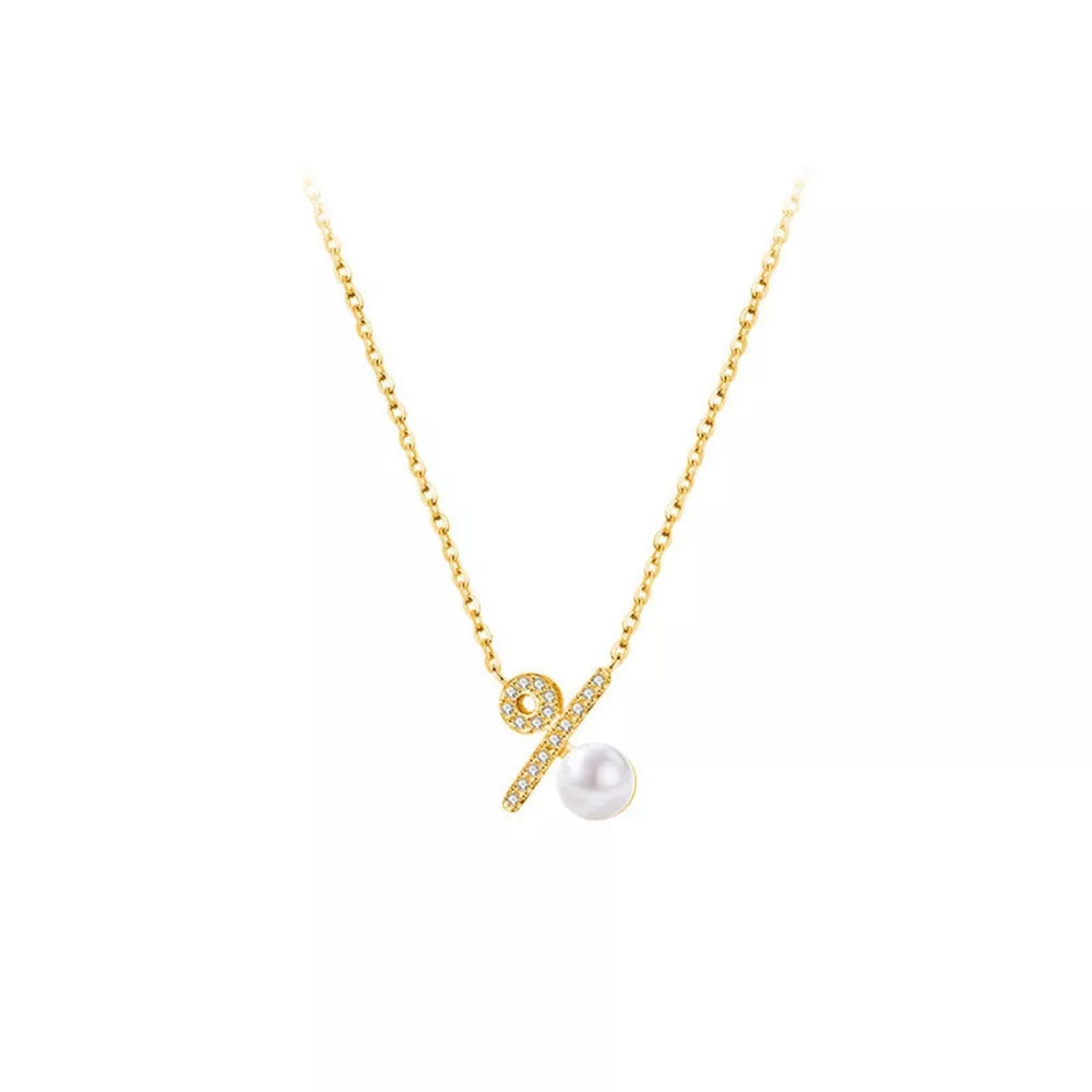 Gold necklace with percentage pendant, cubic zirconia accents, and pearl detail.