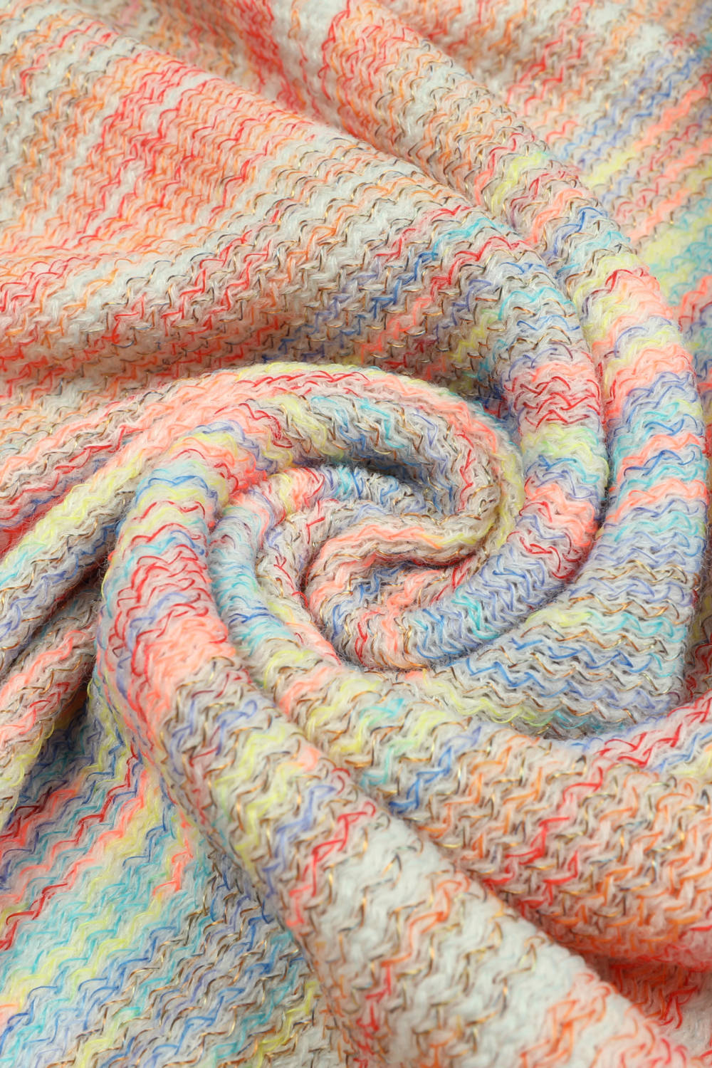Textured knit cape with rainbow stripes and metallic threads