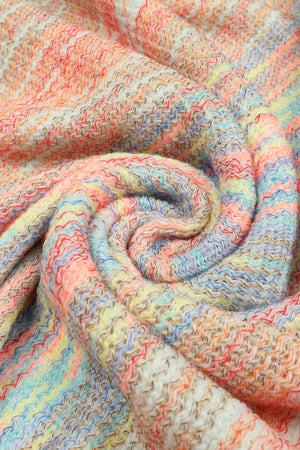 Textured knit cape with rainbow stripes and metallic threads