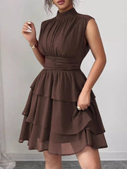 Dark Brown sleeveless ruffle tiered dress with ruched bodice and waist.