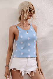 Pastel blue polka dot knit tank top with a keyhole neckline.
