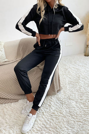Black cropped tracksuit with white stripe details on sleeves and pants