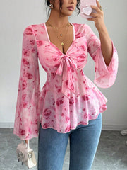 Pink floral chiffon blouse with bell sleeves and tie-front neckline