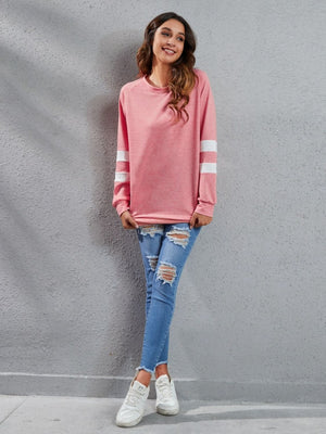 Varsity Stripe Raglan Sweatshirt Dress in burnt coral with white sleeve stripes, 100% polyester.
