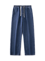 Relaxed wide-leg jeans in dark blue denim with a drawstring waist.