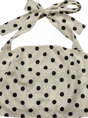 Cream polka dot cami with a tie halter neck and matching bow detail.