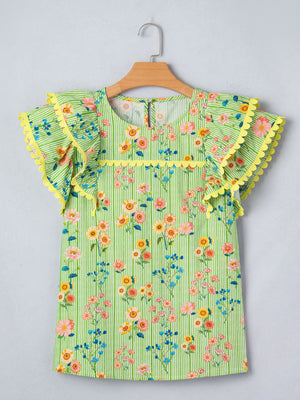 Green striped cotton blouse with floral print, ruffle sleeves, and yellow trim.