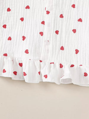 White cotton baby set with red heart print and ruffled hem