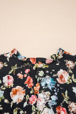 Black floral maxi dress with ruffled neckline and smocked waist detail